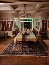 View from dining room to the wrap-around solarium. We ate breakfast on the solarium porch each morning at a private table