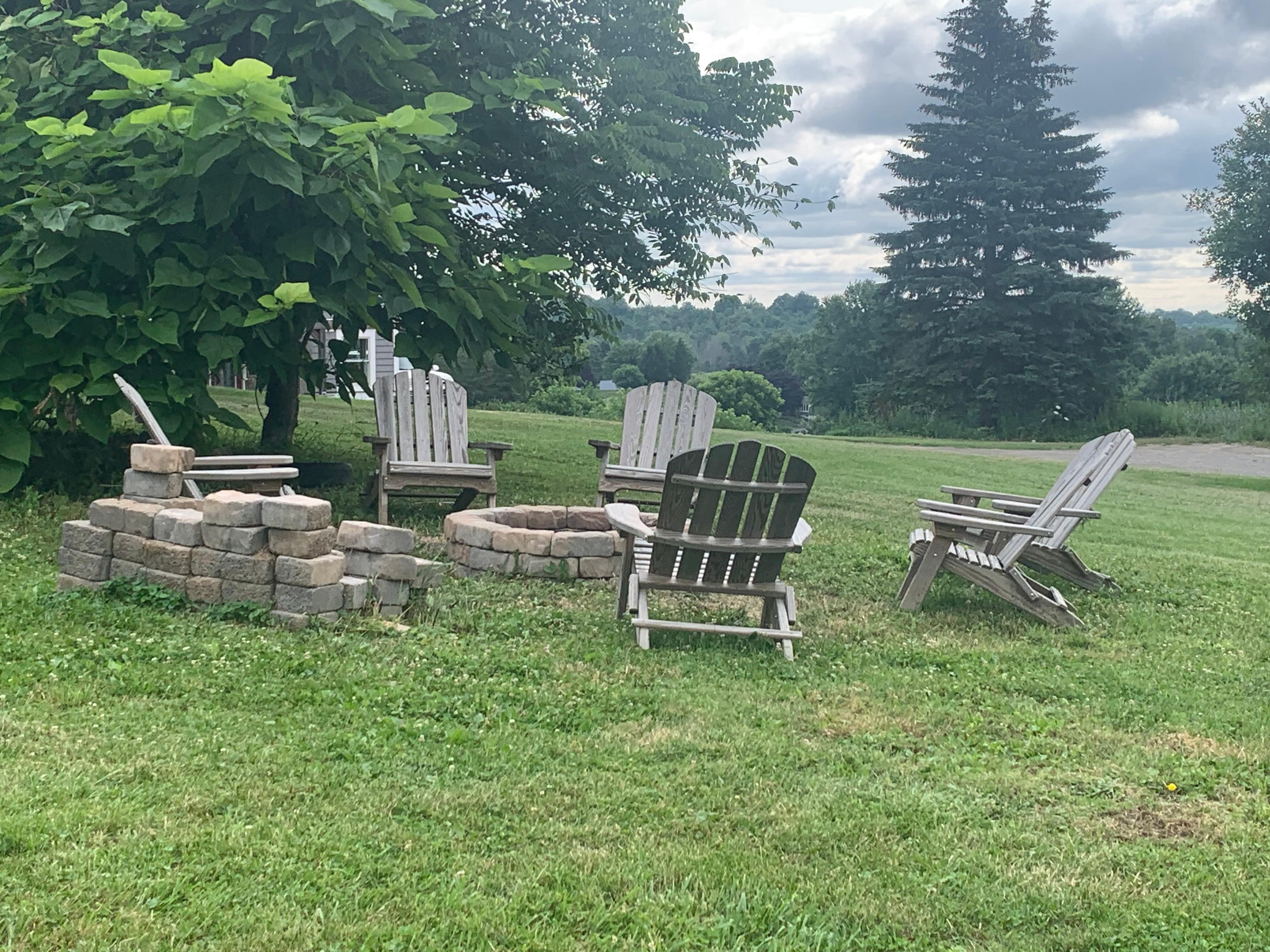 Fire pit outside and available outdoor games (corn hole and outdoor jenga)