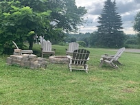 Fire pit outside and available outdoor games (corn hole and outdoor jenga)