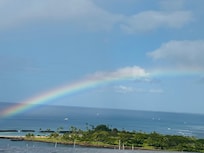 Rainbow in front of balcony