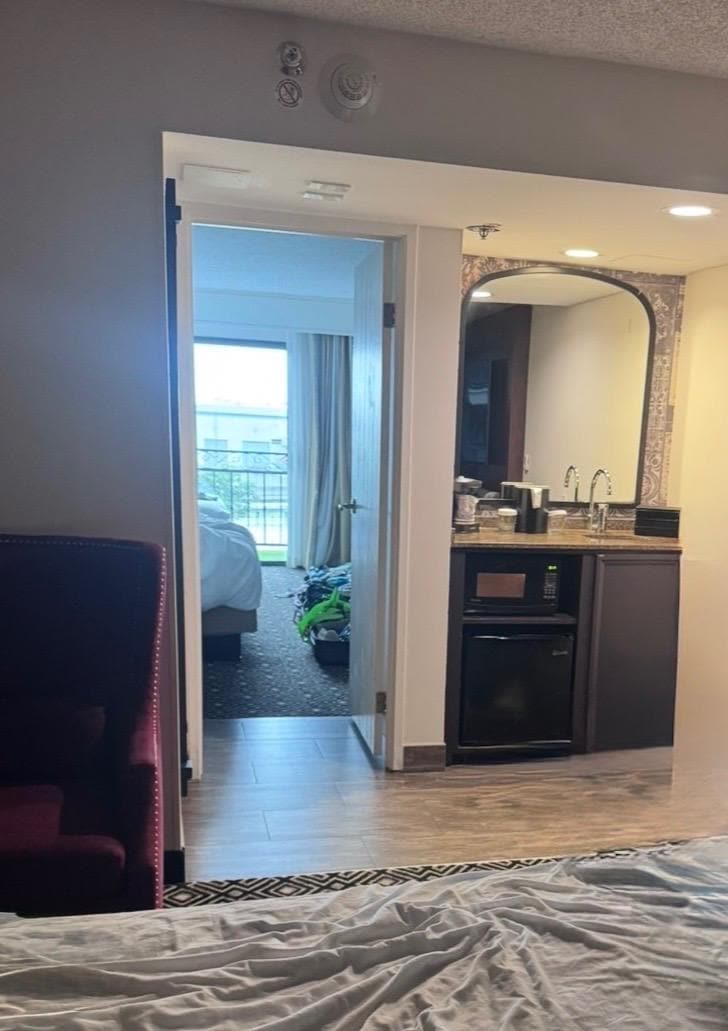 This is the room looking from the door you walk in. The hide a bed is out. There is also a table in the front room. 