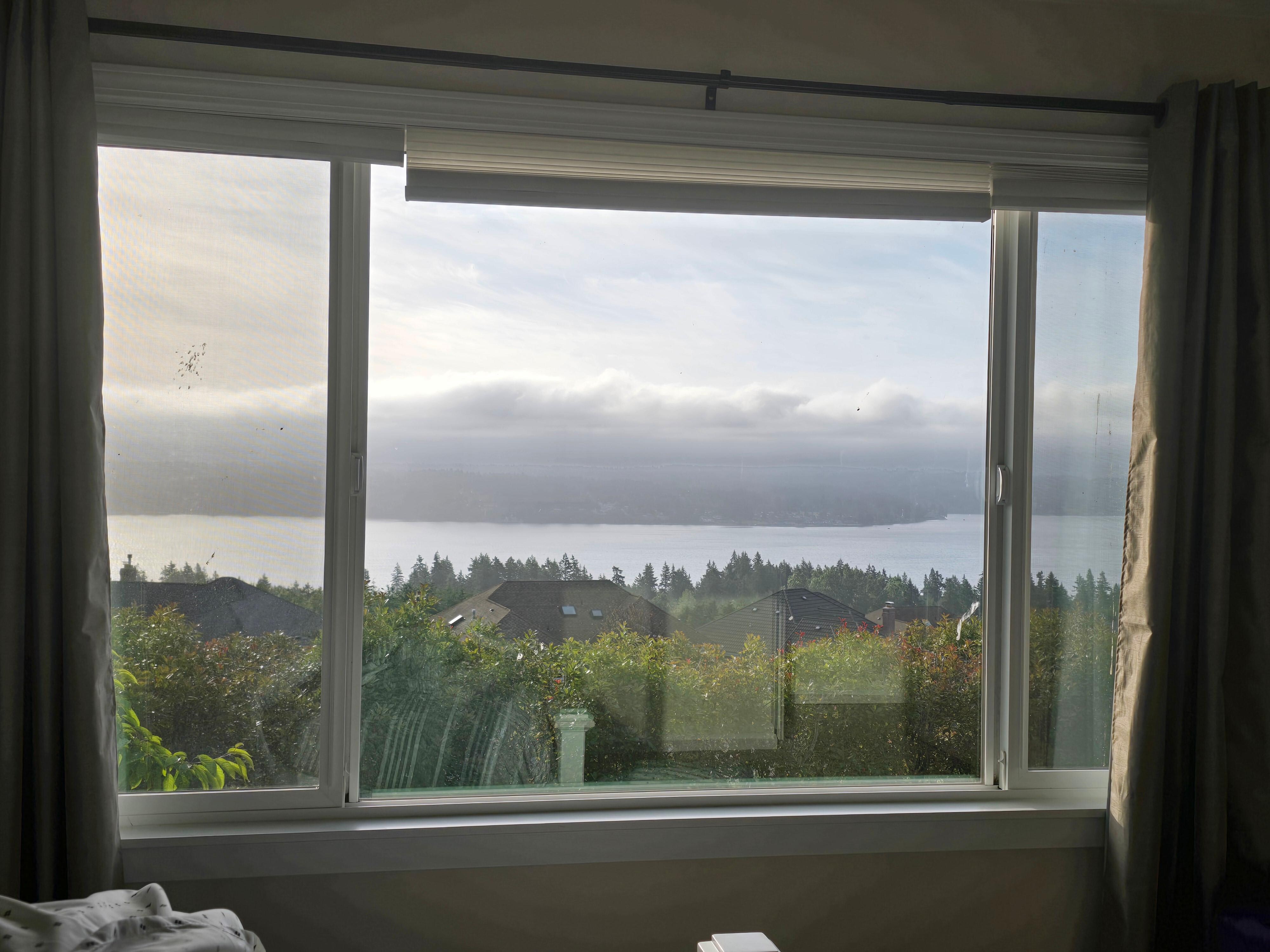 Bedroom windows view. It was cloudy, and you couldn't see the mountain, but still a beautiful view!