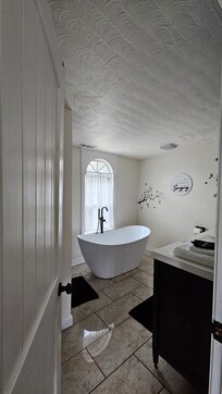 Bathroom with great soaker tub (both bathrooms also have showers)