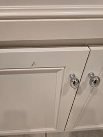 Food/Debris on Kitchen Cabinet