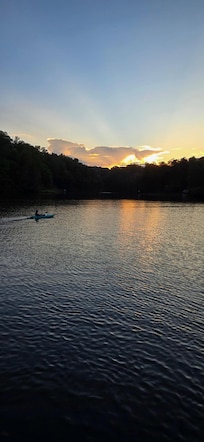 enjoying the canoe on the lake during sunset