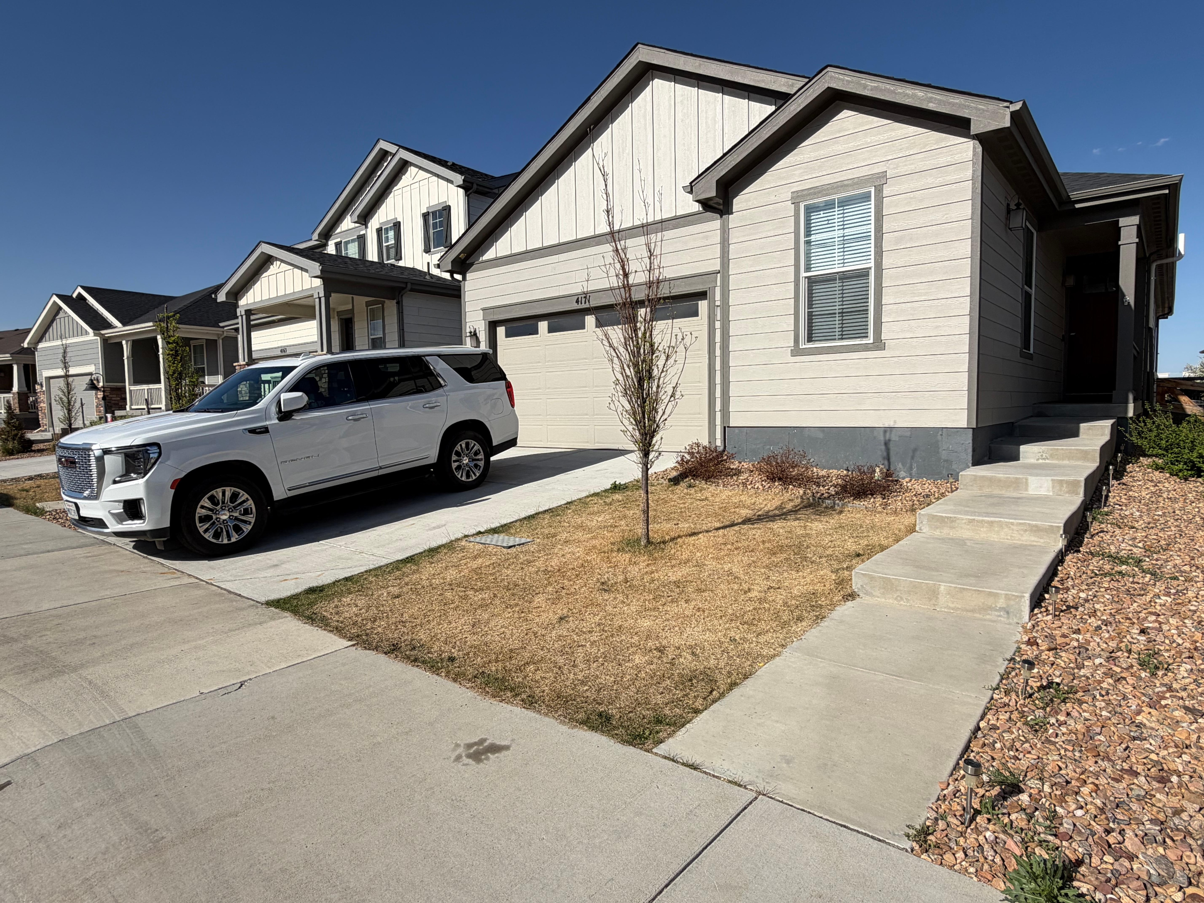 Front view of property with a garage that fit our rented large SUV.