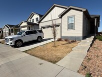 Front view of property with a garage that fit our rented large SUV.
