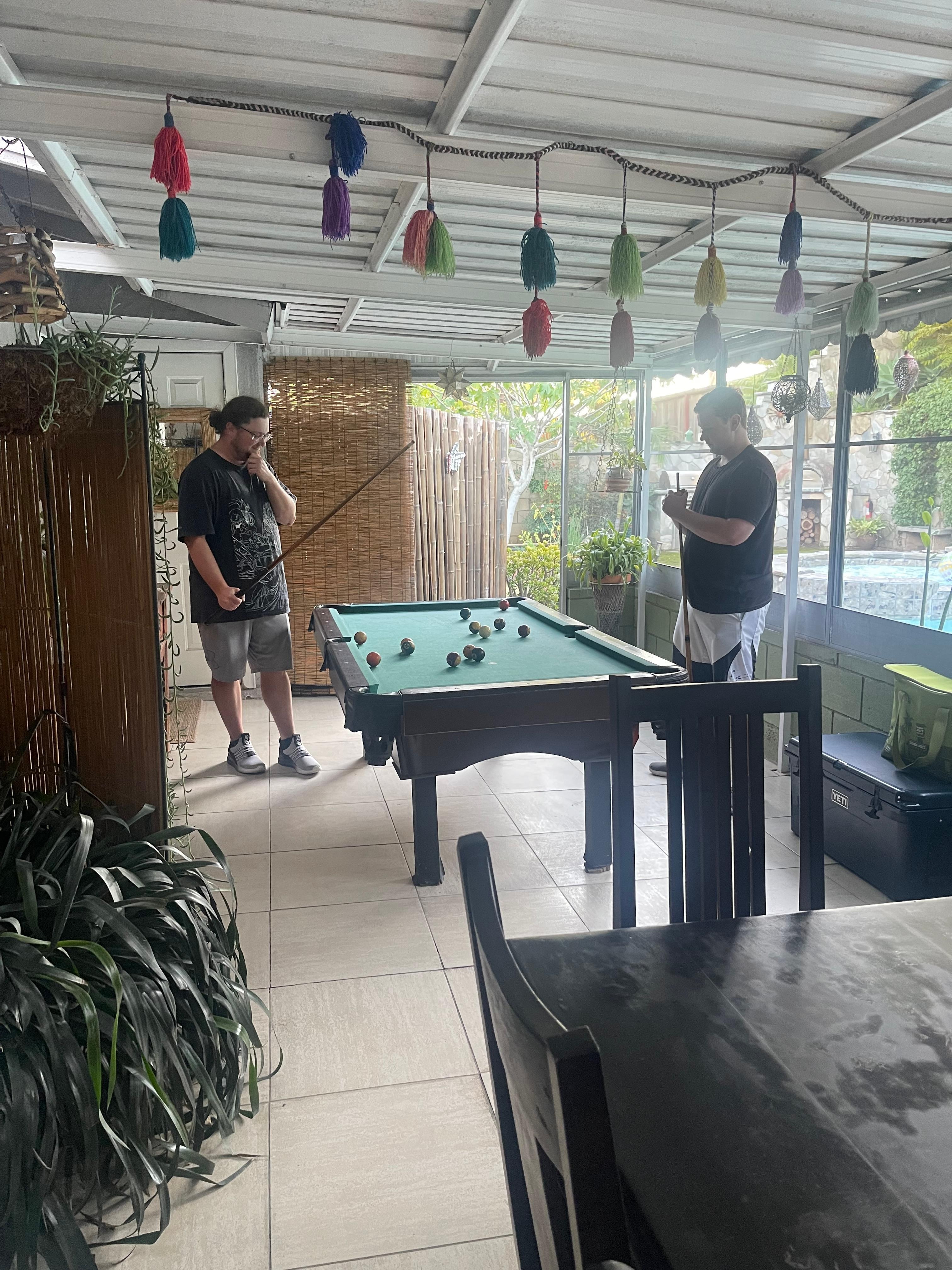 Pool table on enclosed patio 