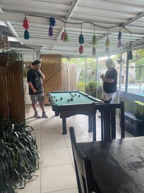 Pool table on enclosed patio