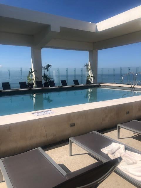 Get your mellow on in the Rooftop pool. Just don't touch/move the chairs - there's some strict rules regarding food/beverage enjoyment and moving the lounge chairs :)