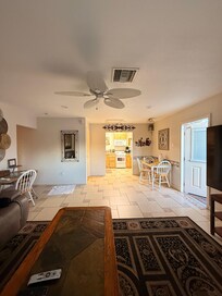 Beautiful living room with recliner couches and coffee table -