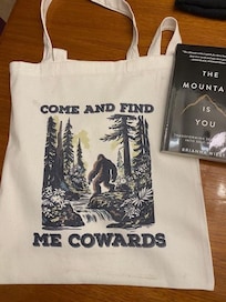 At the kitchen table reviewing our finds from the morning walk.