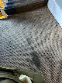 Carpeting going up to apartment