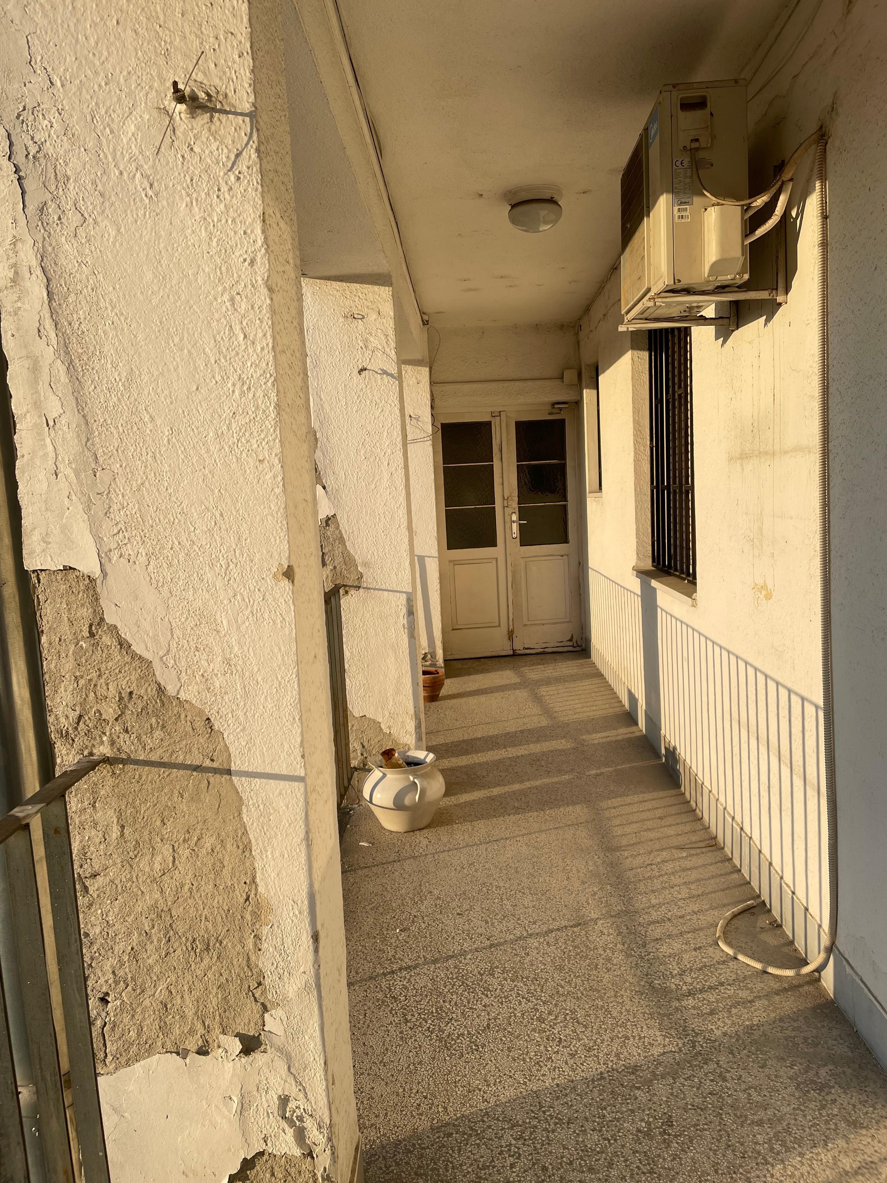 Just outside apartment door