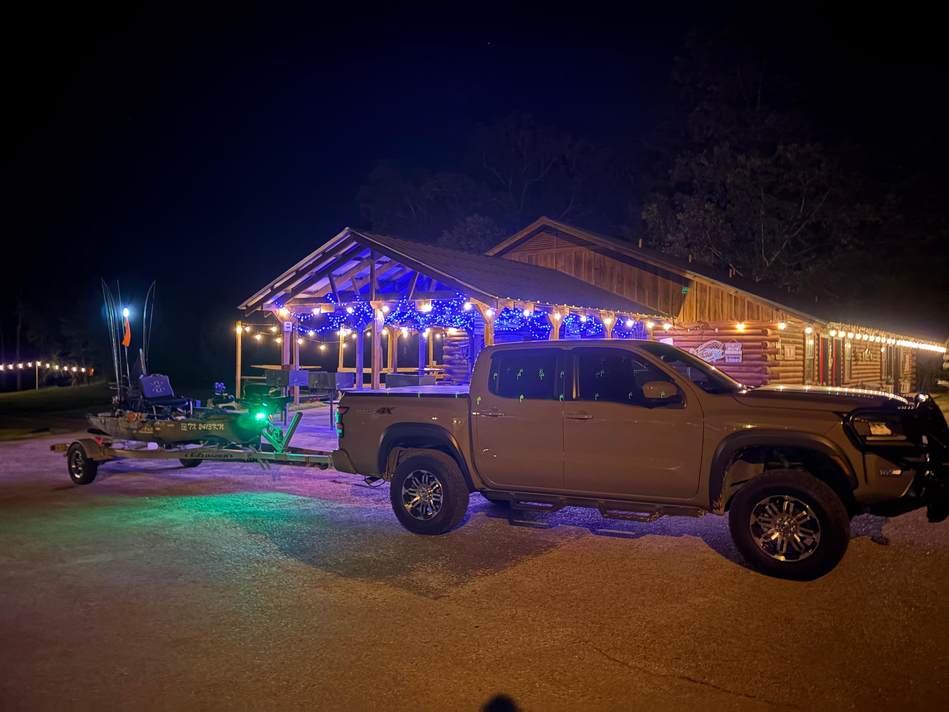 Getting the kayak ready early in morning by the lights