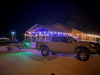 Getting the kayak ready early in morning by the lights