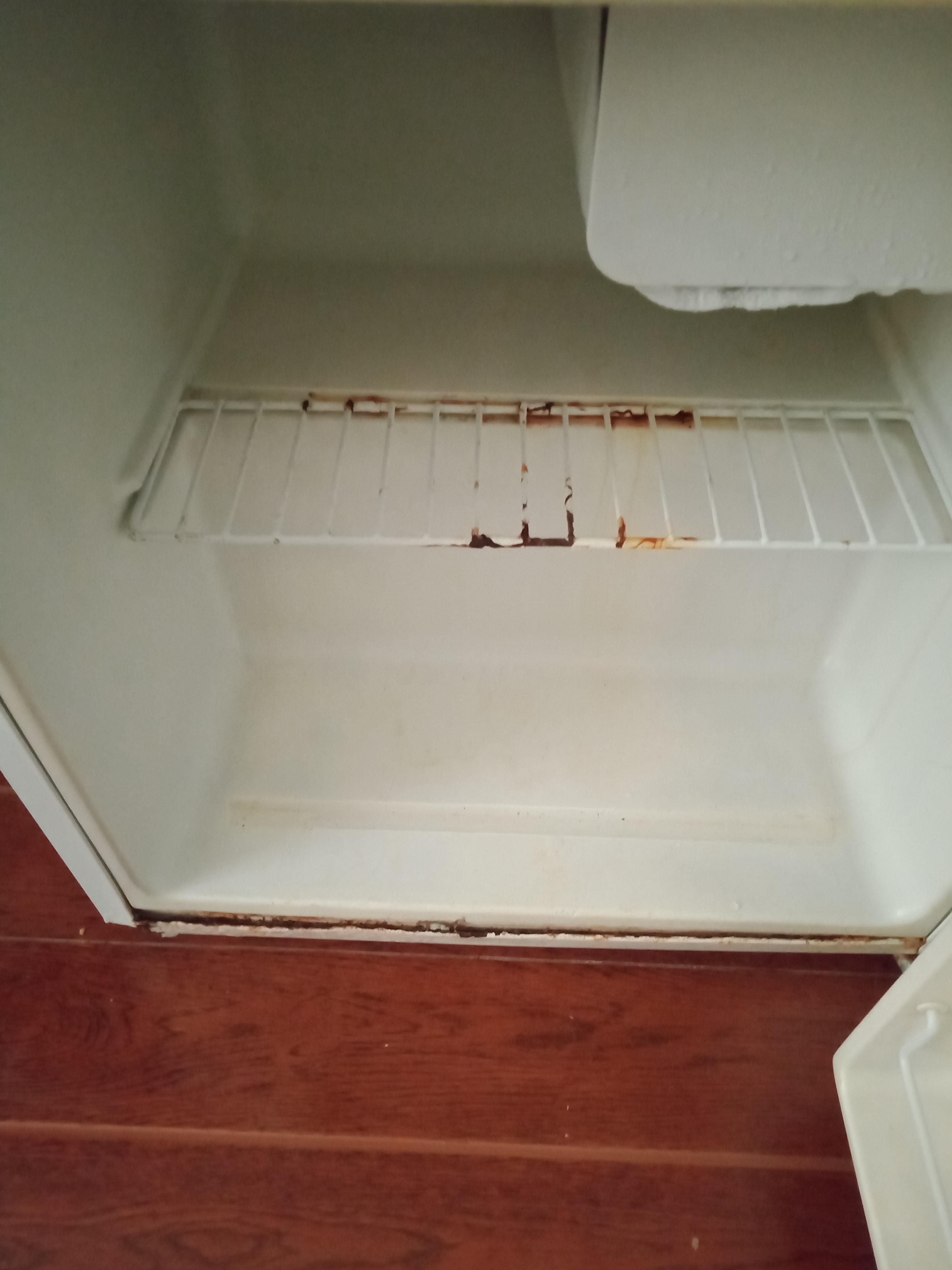 Rusted mini fridge