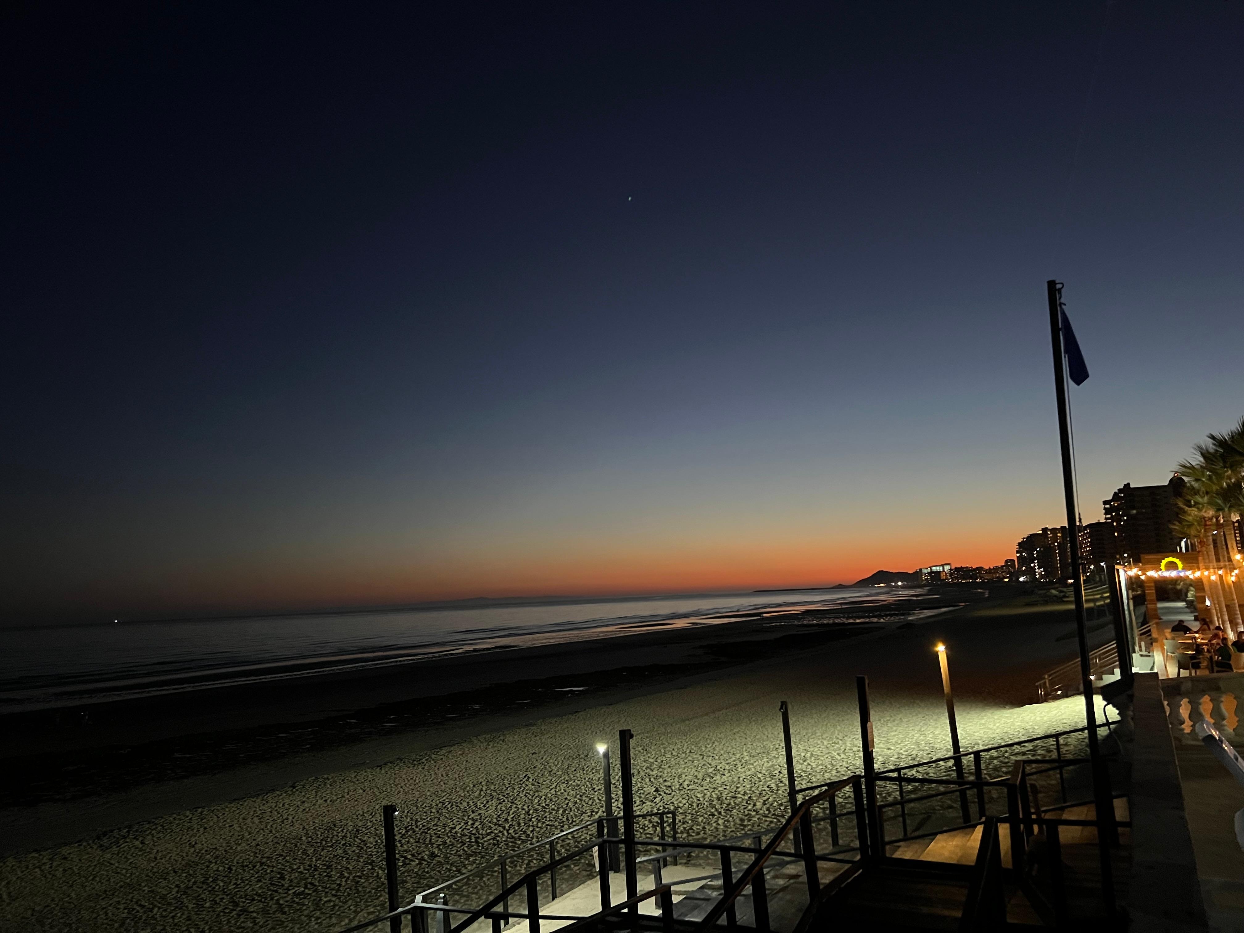 View of the beach at dusk