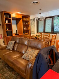Beautiful living room area and dining room for sit down gatherings