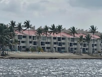 View of the condos from pier down beach