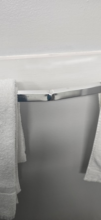 Bent towel rack