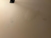 mold in the ceiling; painted over