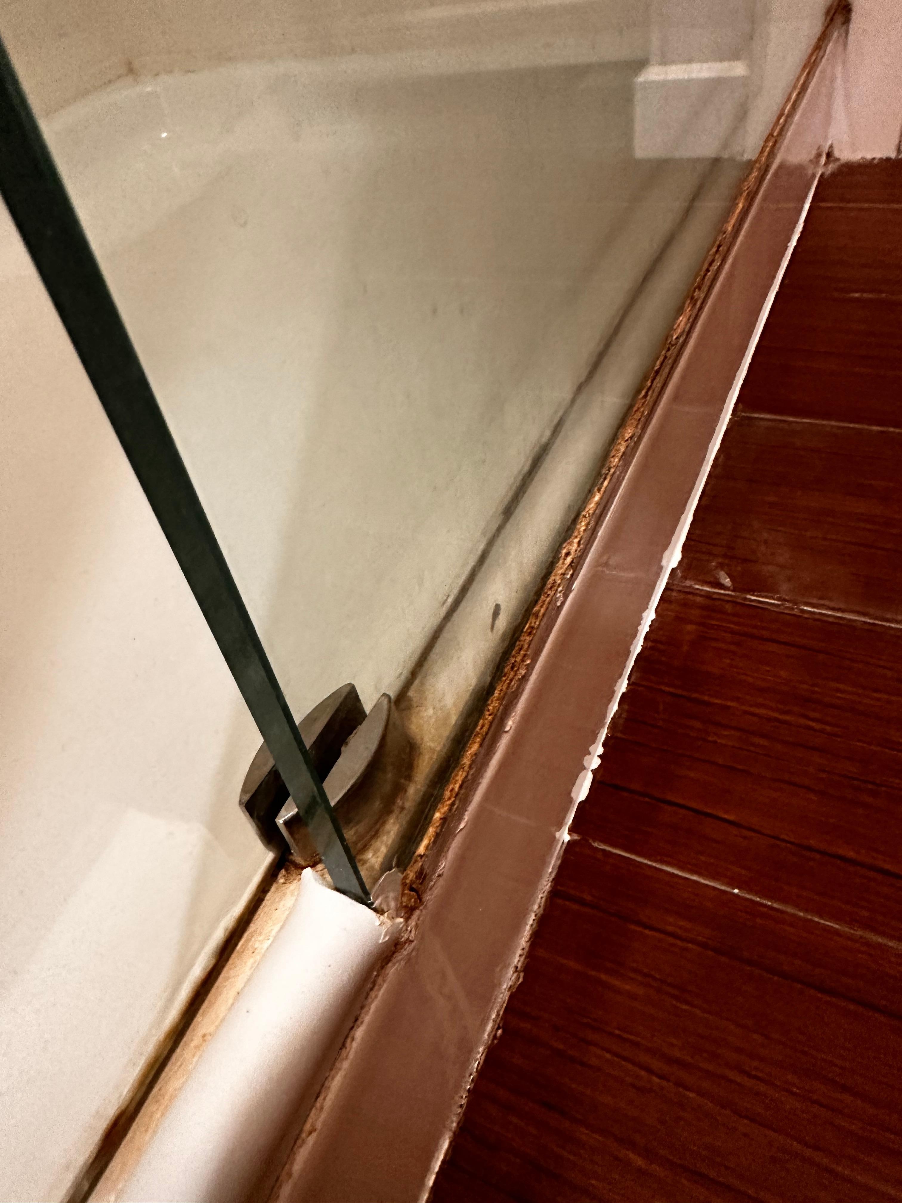 Shower door glued shut and dirty