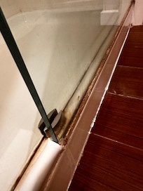 Shower door glued shut and dirty