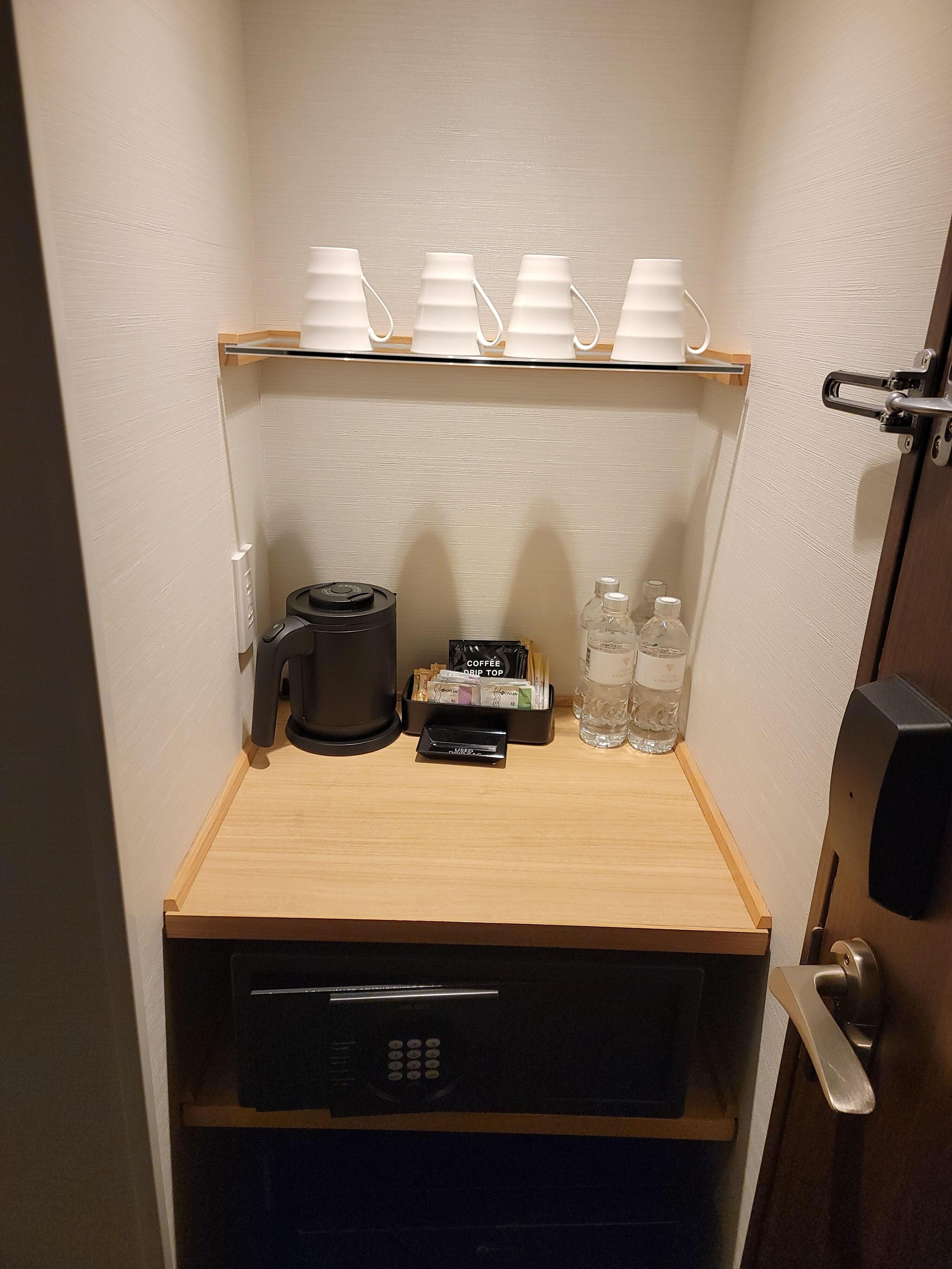Mini fridge and coffee