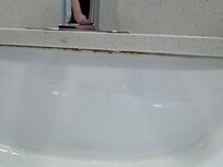 Sludge in edge of sink