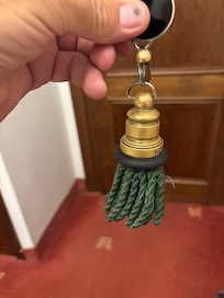 The room key! Every time you leave the hotel to venture out you leave the key at the front desk. No chance of losing it!