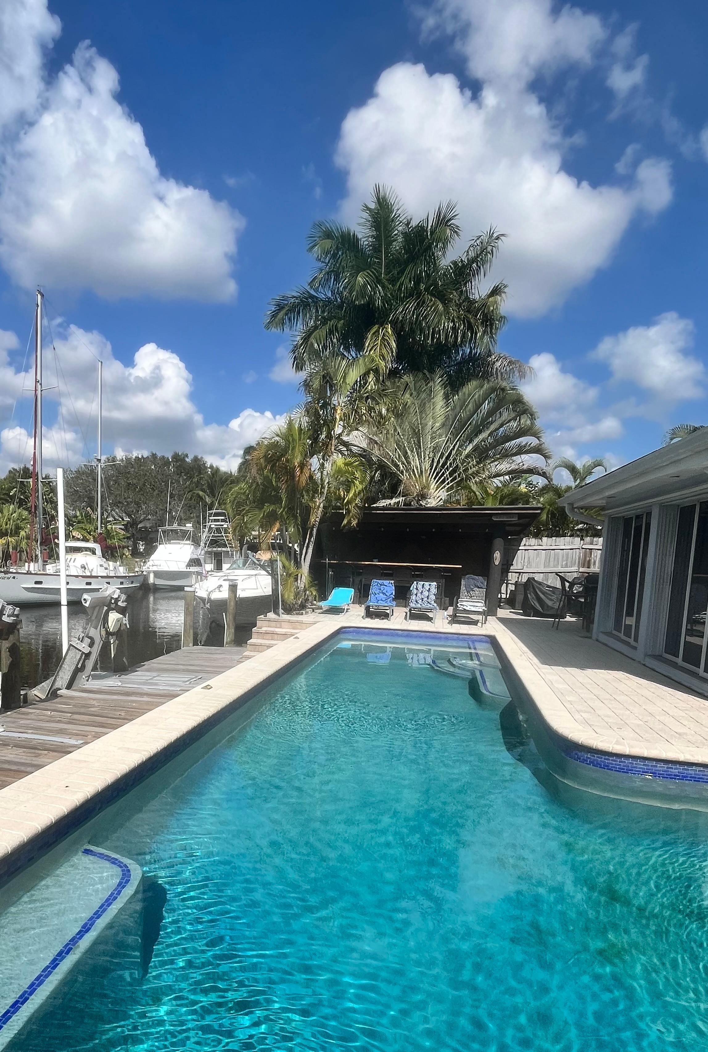 View of the pool and tiki bar.
