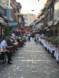The street near by with many restaurants and live music
