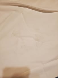 Makeup on sleeper sofa sheets.