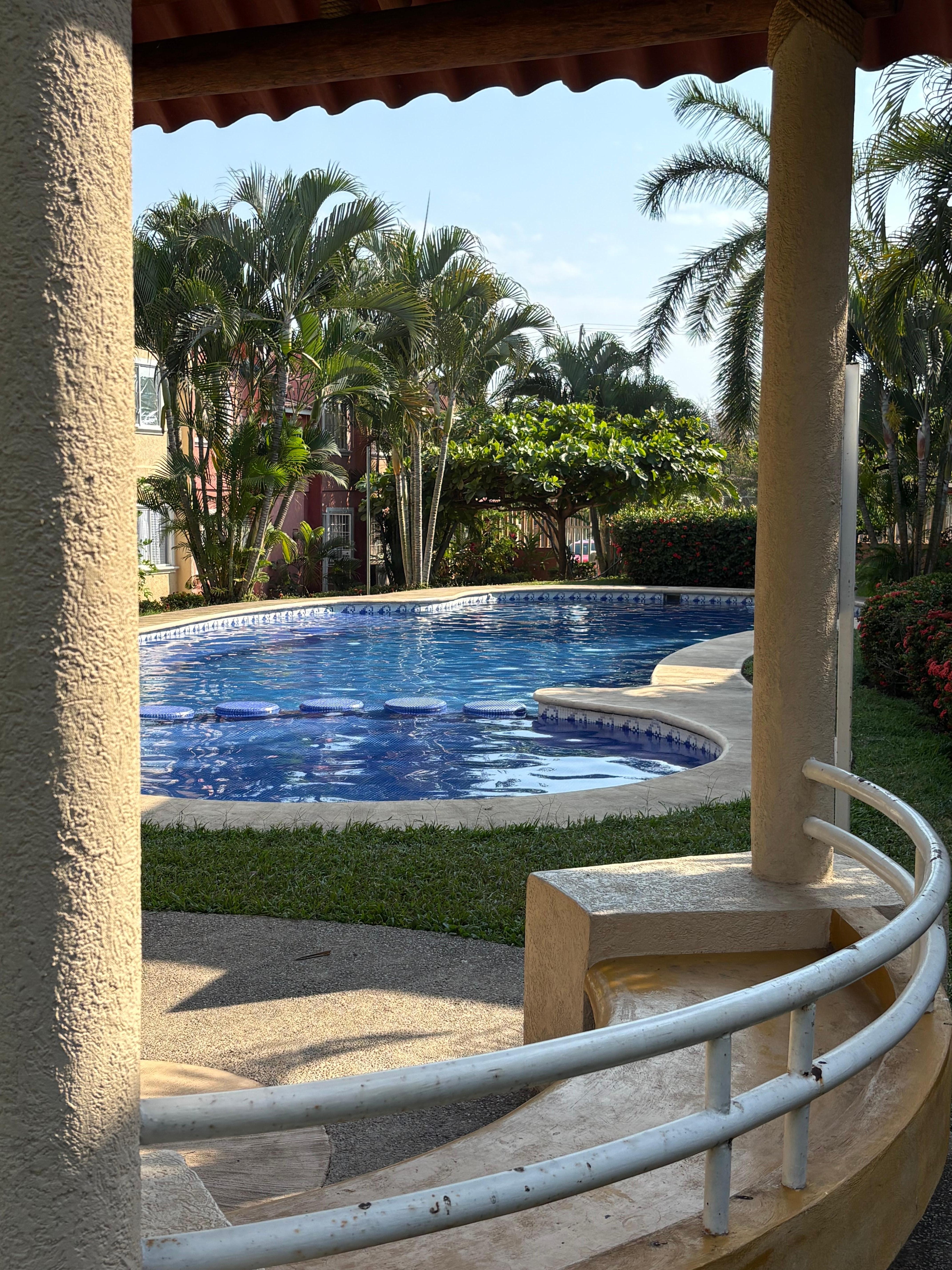 pool has a covered area to have a small family event.