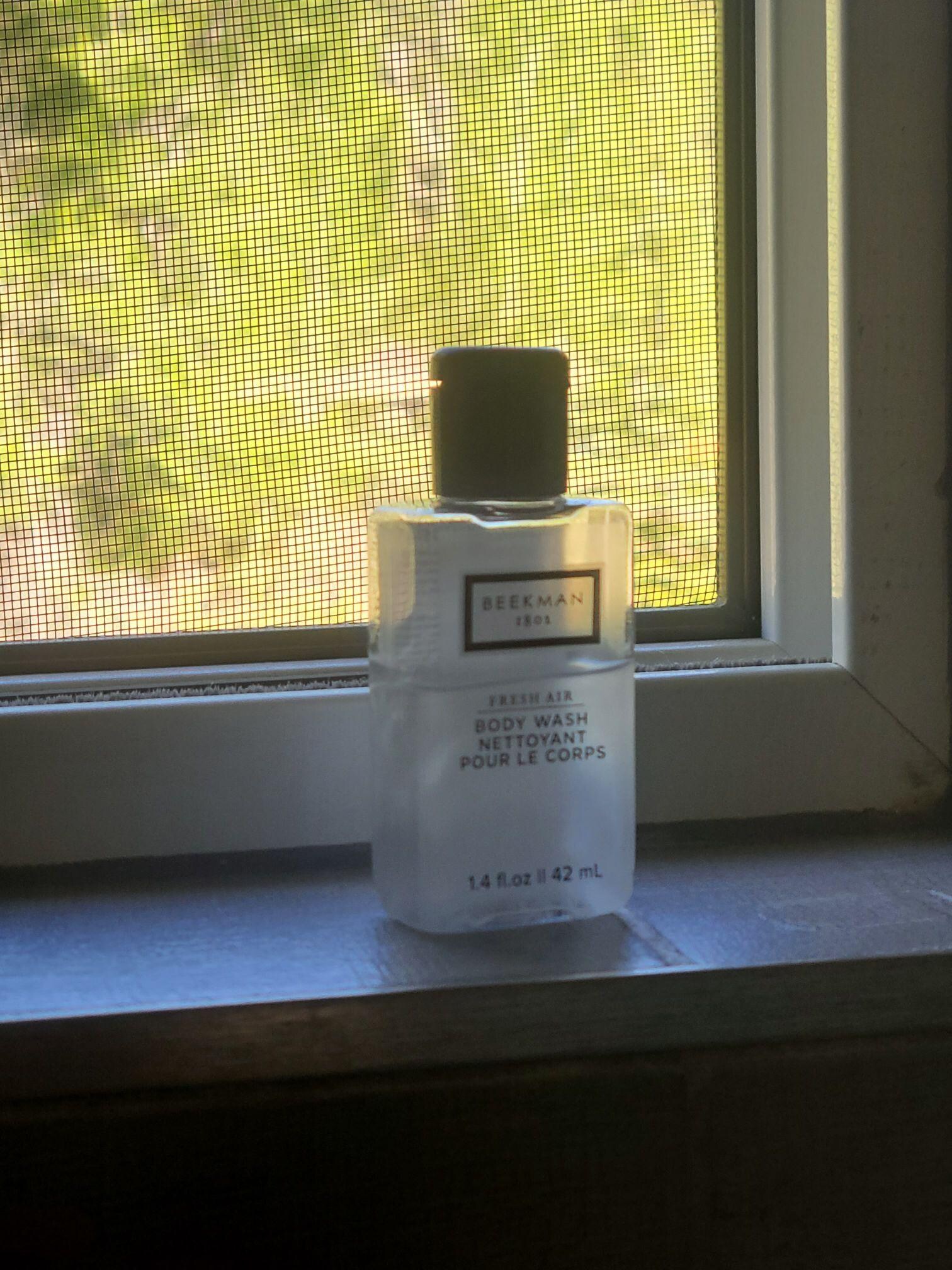 Half used bottle of body wash.