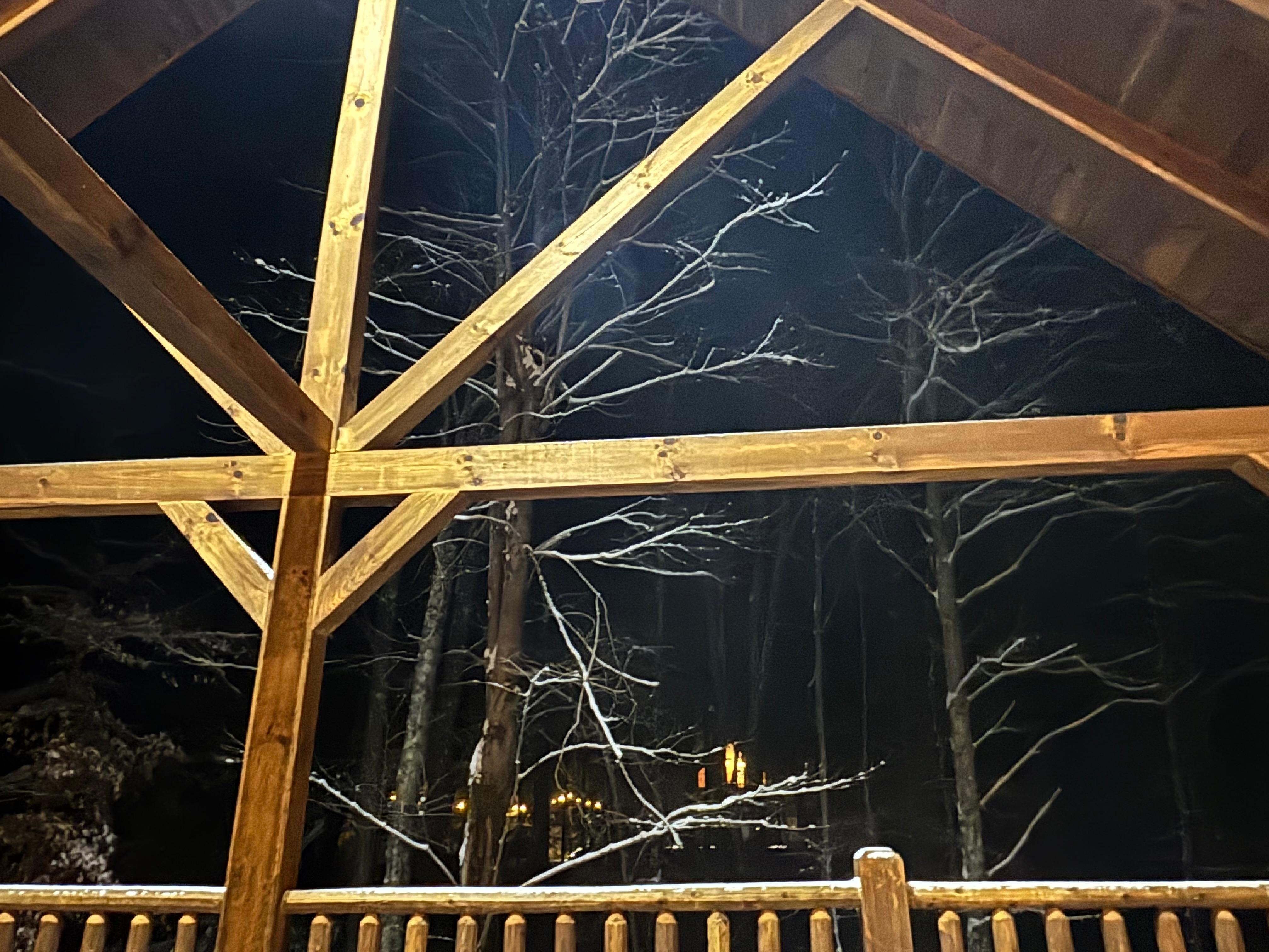 Nice covered wrap-around deck with plenty of outdoor seating.