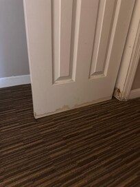 Closet doors that won’t move because of water damage
