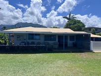 View of the back of the house. Beach to your back. Wish I could add more pictures!