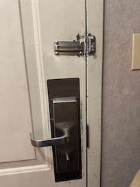 Door lock missing and bottom door bolt nonfunctional