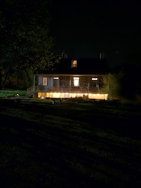 The spring house at night