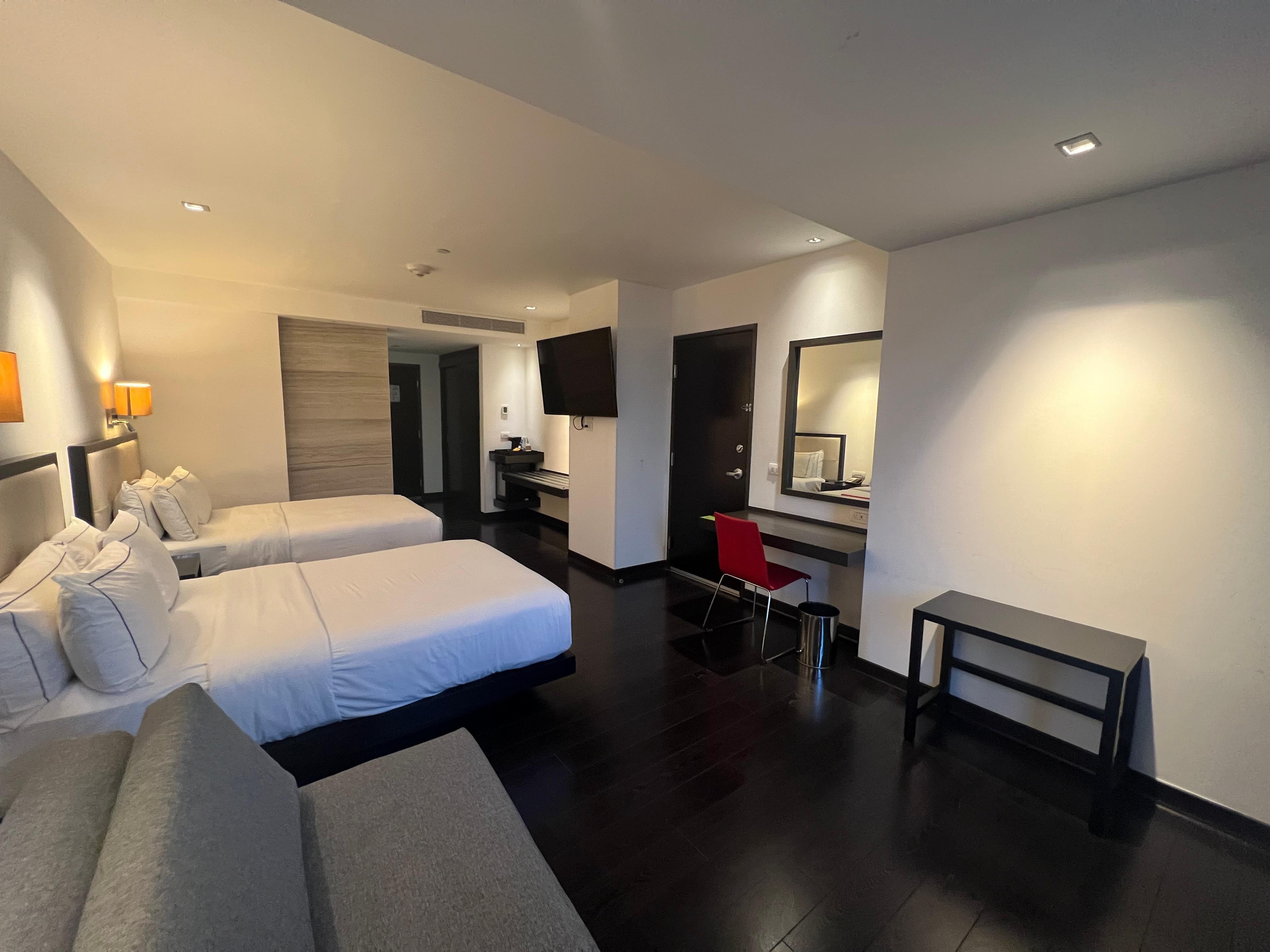 Quarto com 2 camas queen