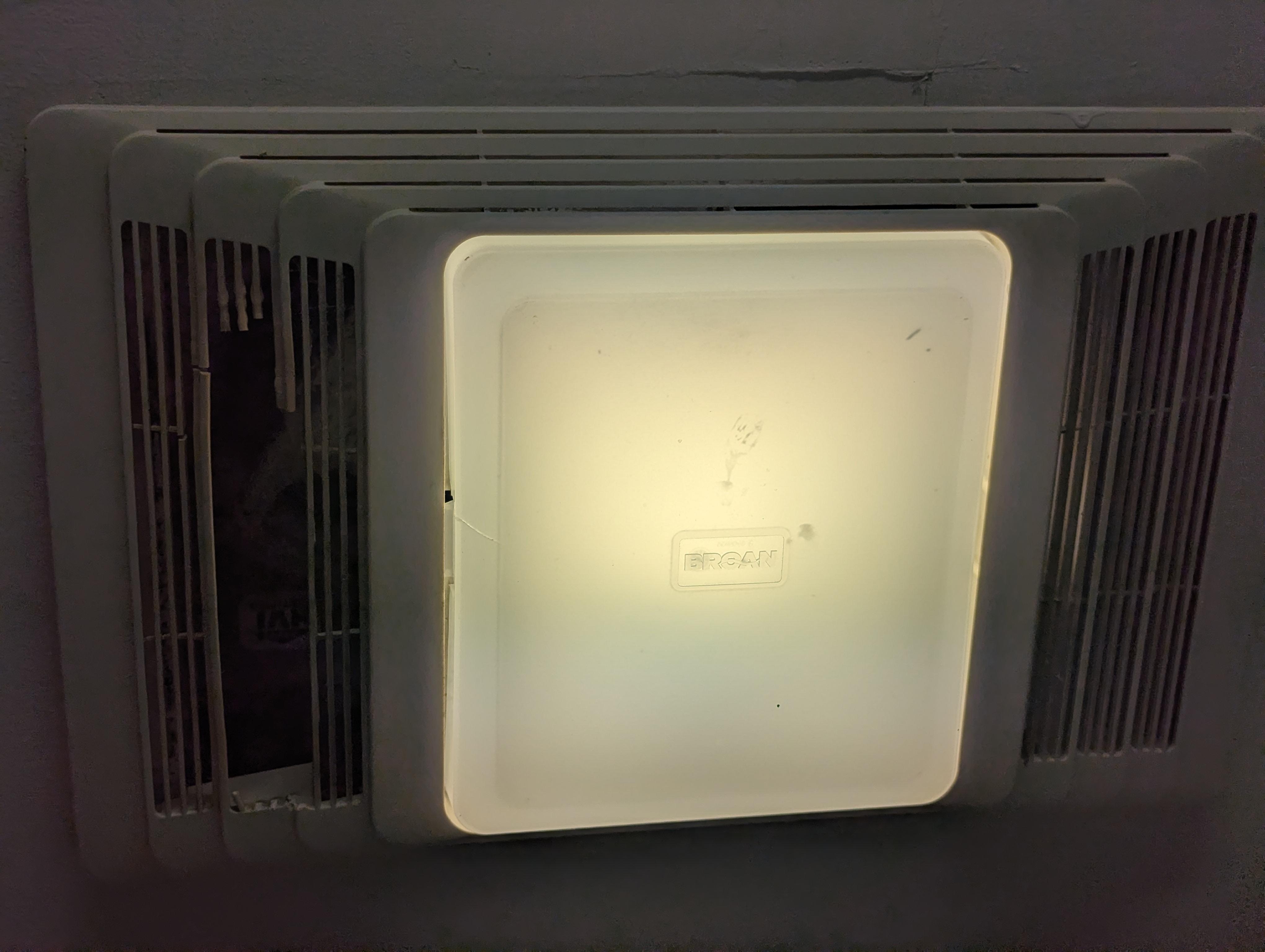 broken & dirty bathroom exhaust fan 