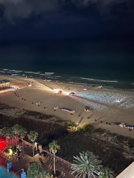 Police on the beach that night (from the balcony of the room).