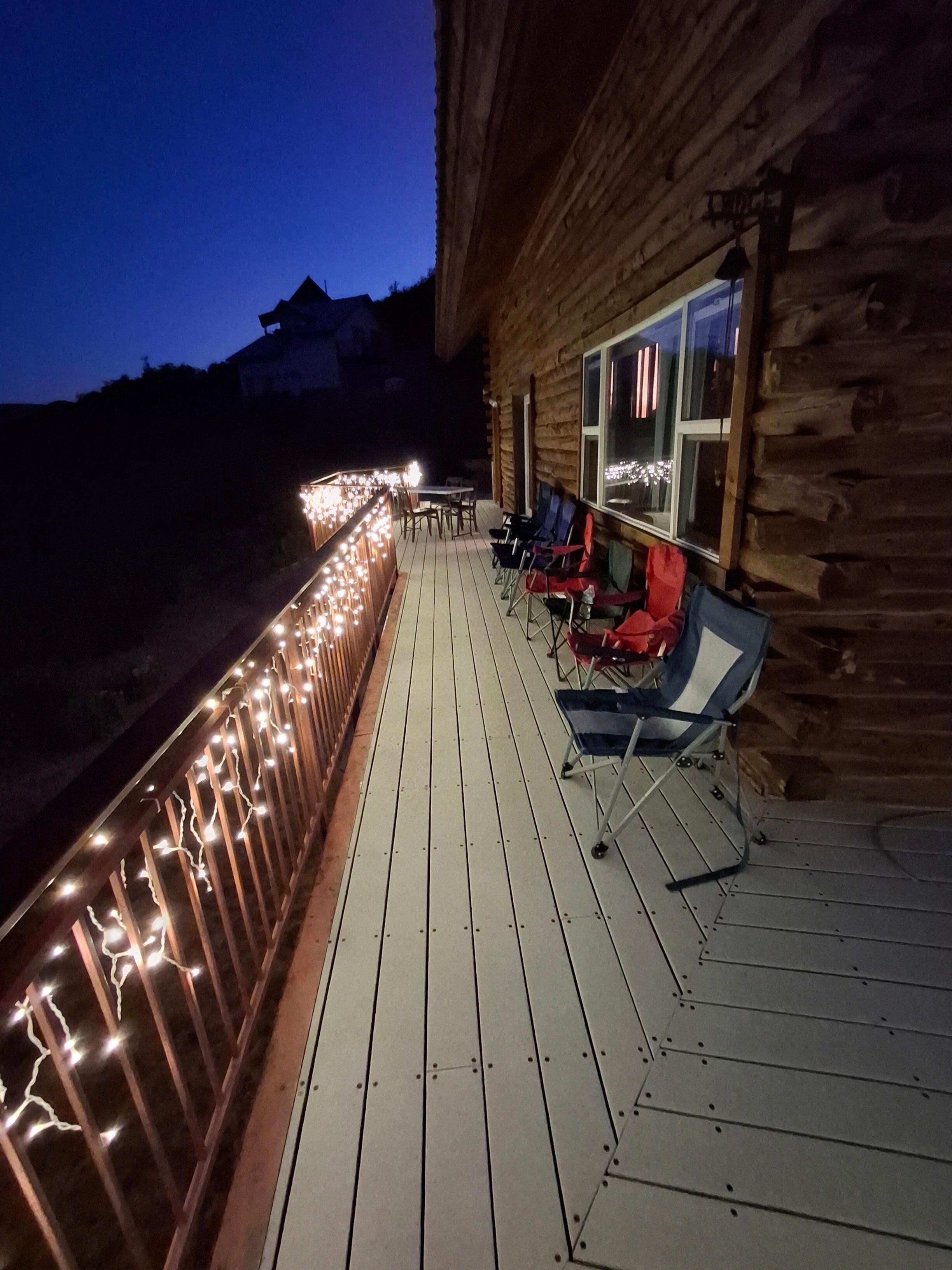 Deck at night with lights on