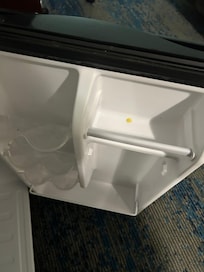 The inside of the mini fridge