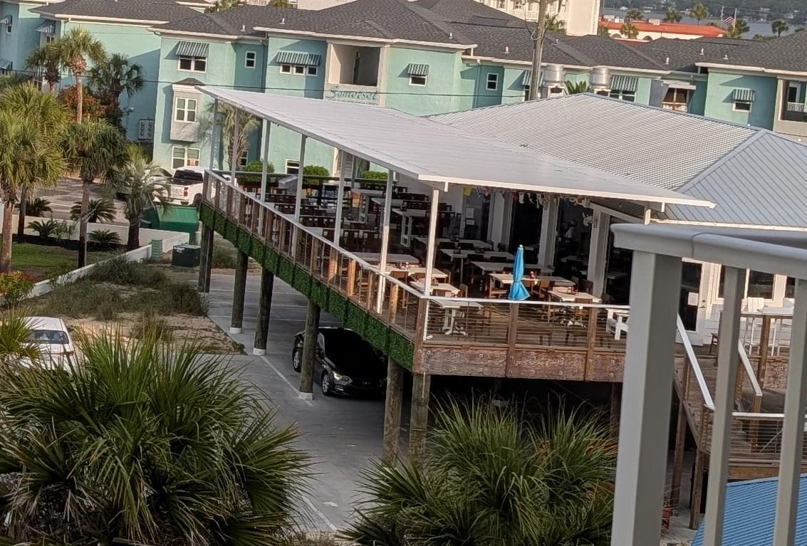 Beachview Restaurant directly nextdoor. Photo from balcony.