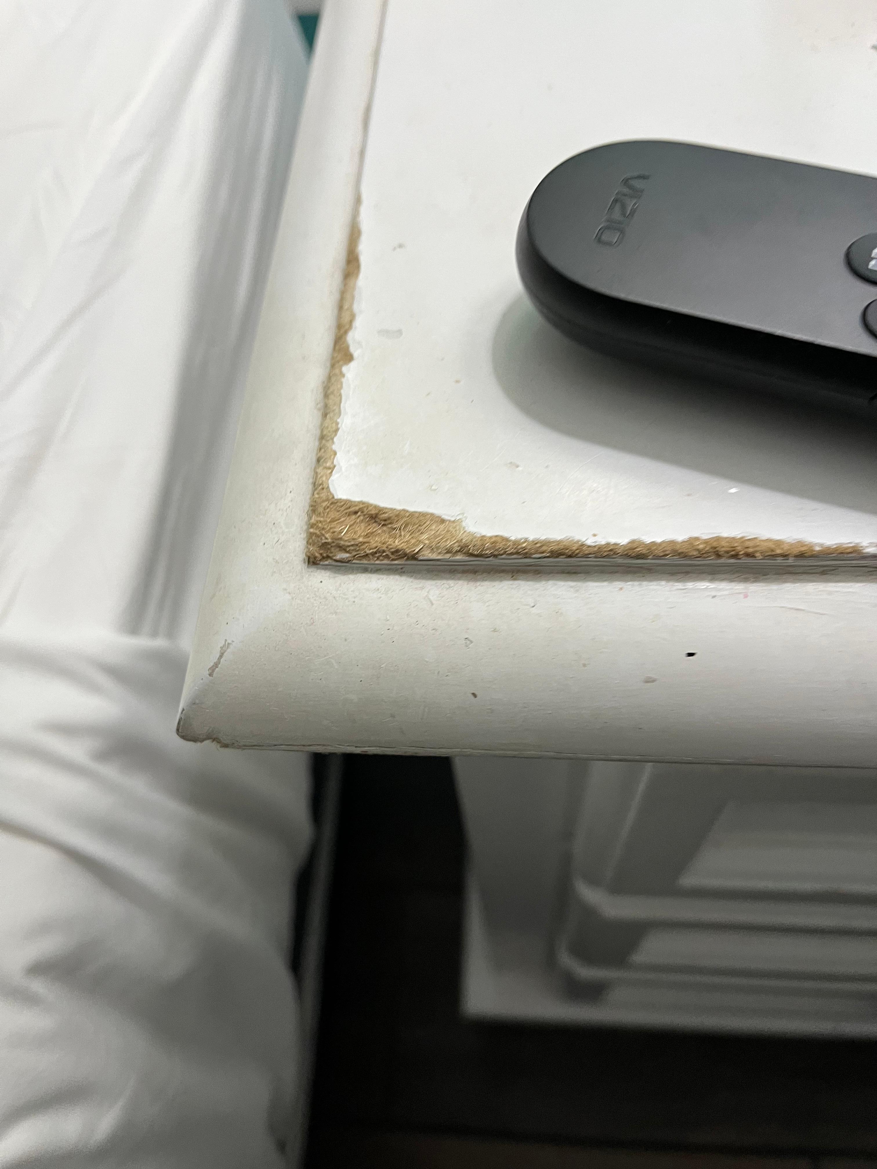 water damaged nightstand