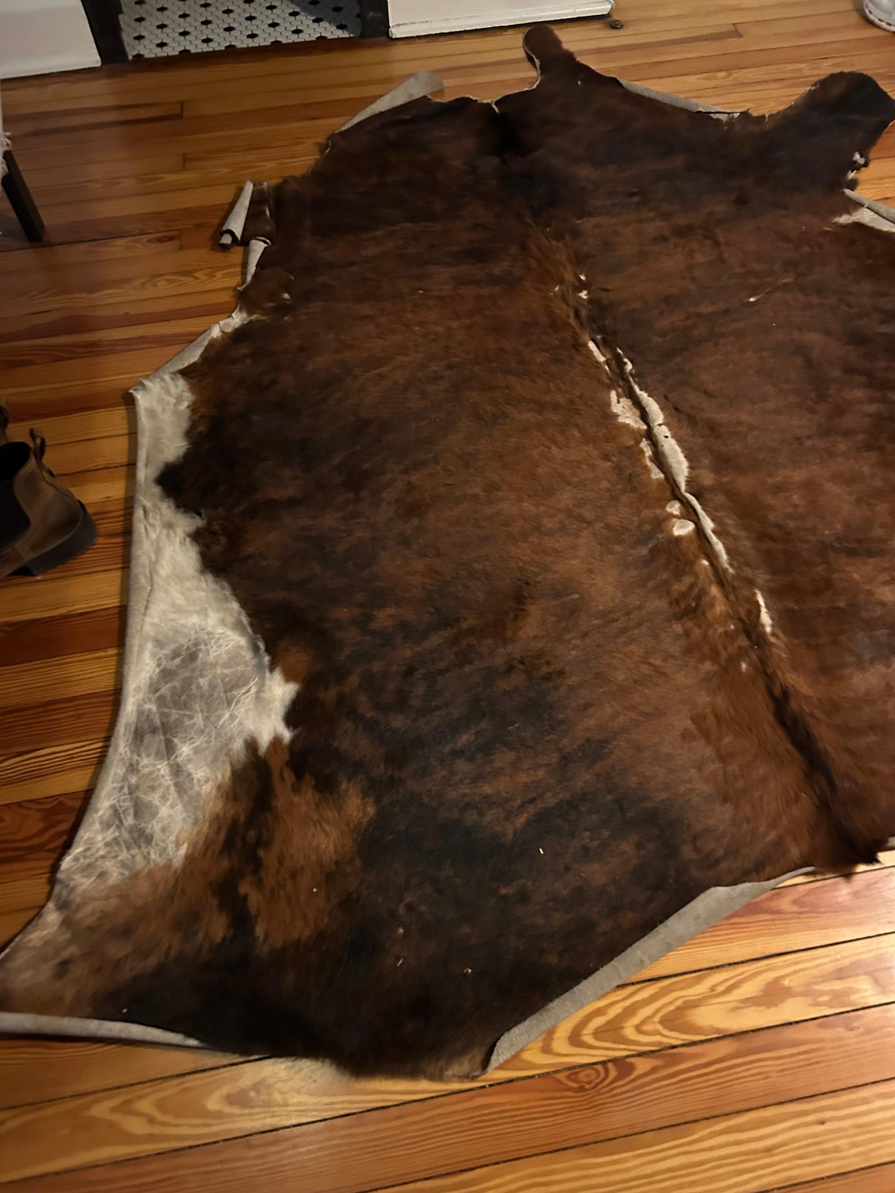 Upstairs bedroom rug was dirty, worn and a tripping hazard 