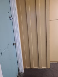 ???Right outside the room door.